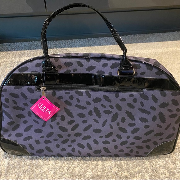 Ulta Rolling Duffle Suitcase